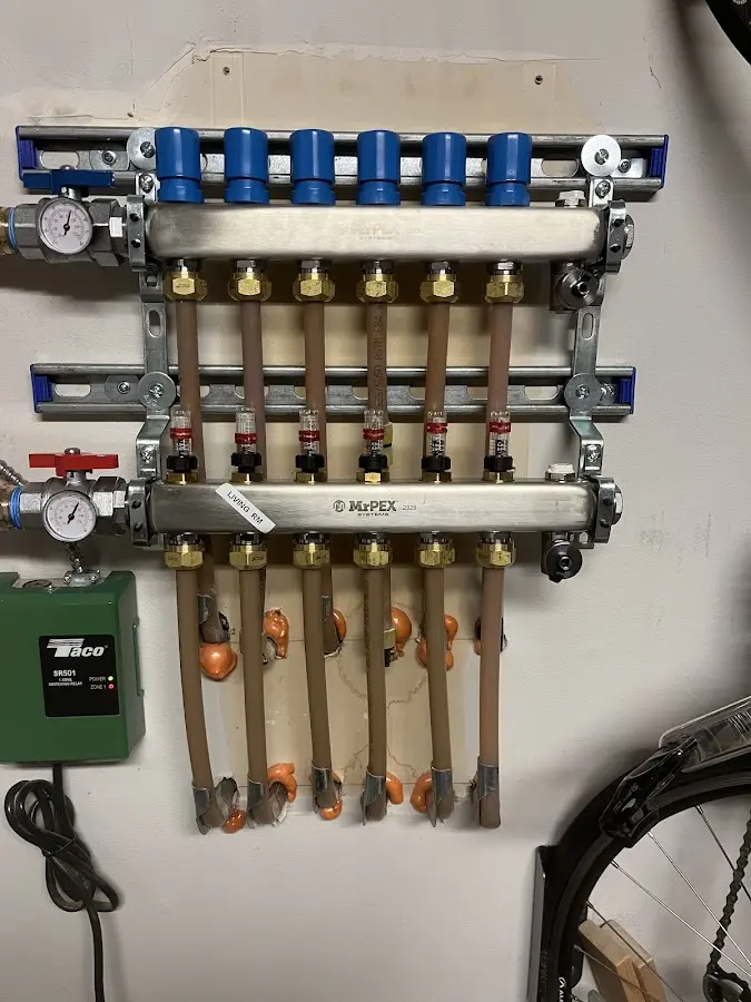 Plumber performing Water Heater Repair at a residential property in Lynnfield